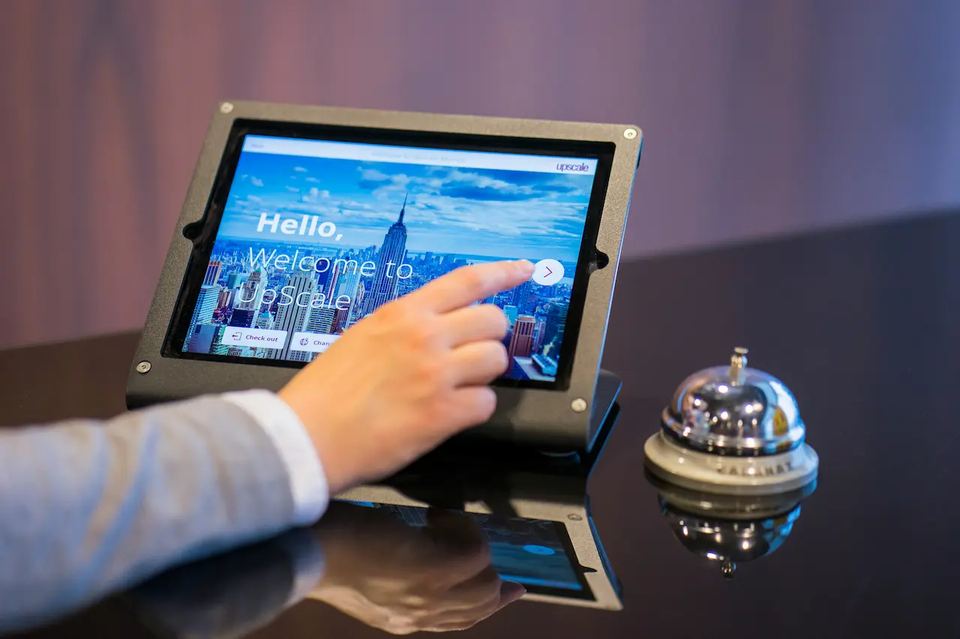 hotel desk registration with digital signage